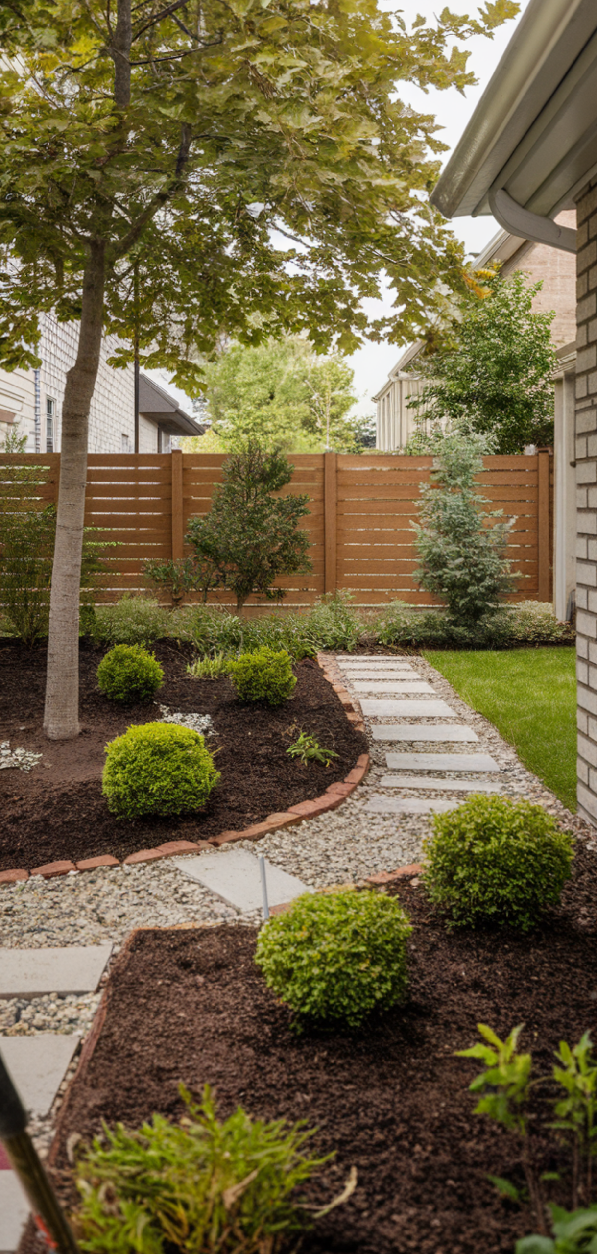 Ways to Landscape a Family Home Side Yard Without Breaking the Bank